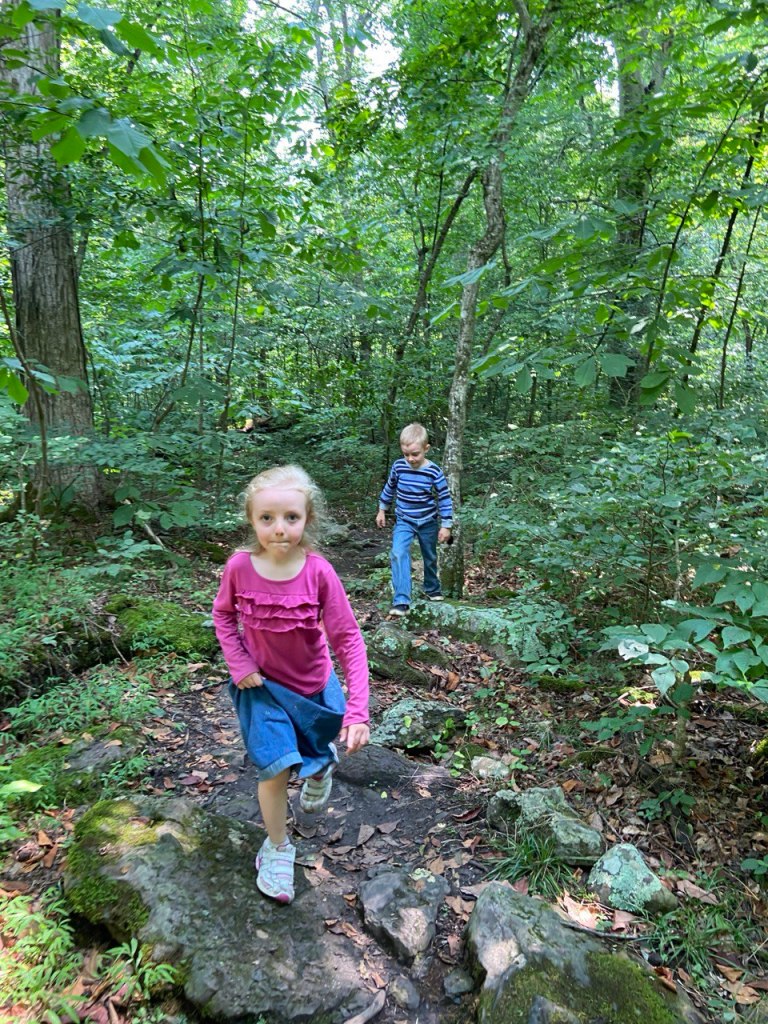 Micah and Alayna hiking back up the trail from the river
