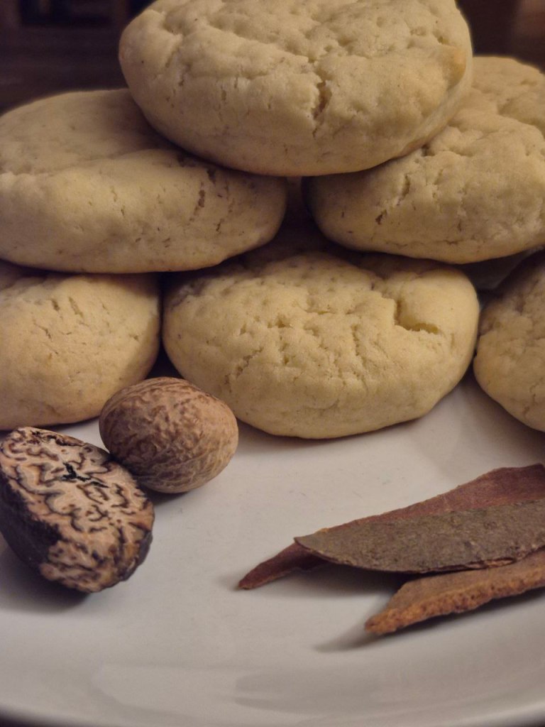a plate of homemade cookies with whole nutmeg and cinnamon pieces